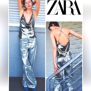 Silver shiny never worn sexy low front open back Zara top.